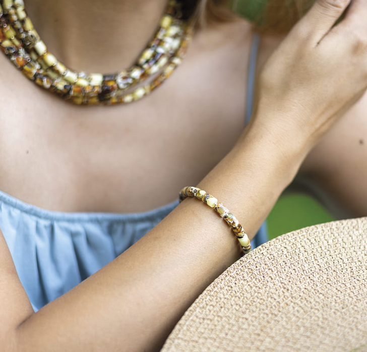 A bracelet with brown amber, mosaic type.