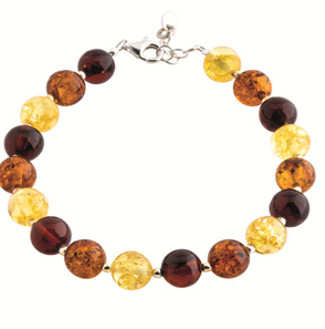 A silver bracelet with three colors of amber