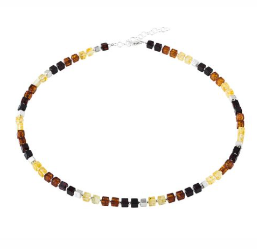 A silver necklace made of amber in three colors and silver cubes.