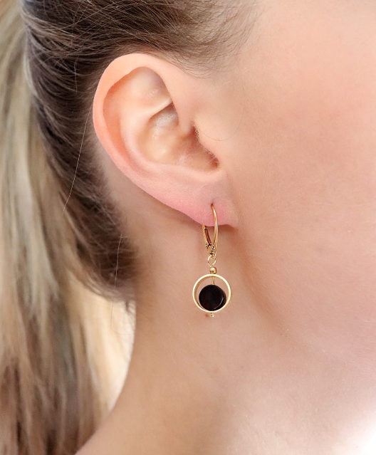 Modern gold and silver hanging earrings with cherry disc Baltic amber and silver circle